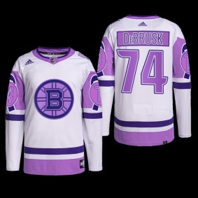 Boston Bruins 2022 Hockey Fights Cancer Jersey Jake DeBrusk White Purple #74 Primegreen Uniform
